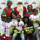 Sarodj Bertin and Nick Cannon Bring Joy To Orphans In Haiti Photo