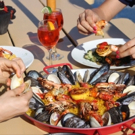 SURF CITY in Jersey City is Serving 10 New Paella Dishes through 8/26