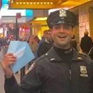 NYPD Officer Helps Out Tourist Who is Short For HAMILTON Tickets Photo