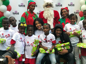 Sarodj Bertin and Nick Cannon Bring Joy To Orphans In Haiti Image
