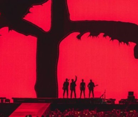U2 Members Bono and The Edge Surprise Fans With Concert On Berlin Subway Image