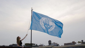 Creative Time Raises Artist Pedro Reyes's Pledges Of Allegiance Flag Image