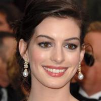 Hathaway Nervous But Ready To Play Garland In 'GET HAPPY' Video