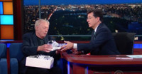 VIDEO: Nike Chair Phil Knight Presents Stephen Colbert with His Own 'Col-Pair'…