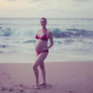 PHOTO: Anne Hathaway Beats Paparazzi to the Punch by Sharing First Baby Bump Pic Video