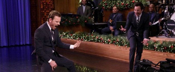 VIDEO: Michael Fassbender & Jimmy Fallon Face Off in Air Guitar Battle Video