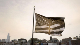 Robert Longo's 'Pledges of Allegiance' Flag Raised by 10 Institutions Nationwide Image