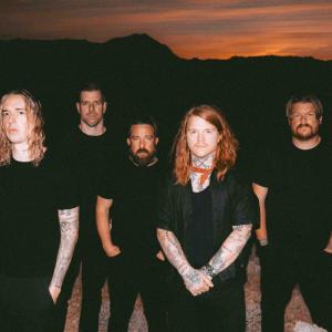 UNDEROATH Shares BREATHING IN A NEW MENTALITY Live Video From Warped Tour Photo