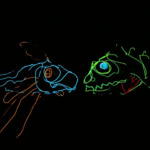 DINO-LIGHT: A Glow-in-the-Dark Adventure to Play Queens Theatre Photo