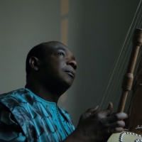 Toumani Diabaté & the London Symphony Orchestra Debut New Track 'Elyne Road' Video