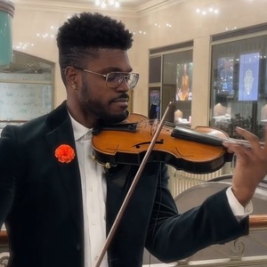 Video: Violinist Edward W. Hardy Performs Ariana Grande, Queen, Puccini & More At His Video