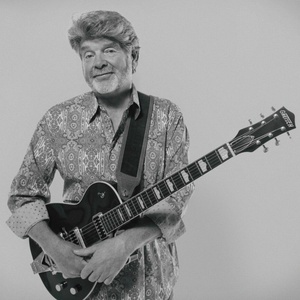 Mac McAnally, Foreigner, & More To Appear on 'Coast-to-Coast Countdown 2026' Telecast Photo