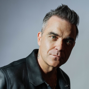 Robbie Williams Releases Forbidden Road Single from BETTER MAN Biopic Photo