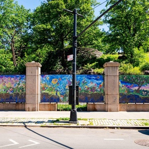 FROM ROOT TO BLOOM Mural by Singha Hon Now on View at Marcus Garvey Park Gates Photo