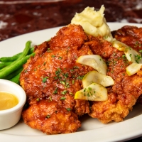 Cooking Time: GRAND LUX CAFE Go-to Recipe for Nashville Hot Chicken Photo