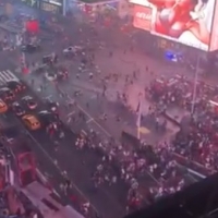 Social: Thousands Flee As Motorcycle Backfire Causes Panic In Times Square Photo