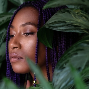Dominique Fils-Aimé Shares Vibrant 'Feeling Like A Plant' Photo