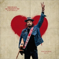 Michael Franti & Spearhead Join Kenny Chesney on Tour Photo