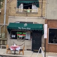 VIDEO: Opera Singers Perform From the Balcony of Victor Cafe Photo