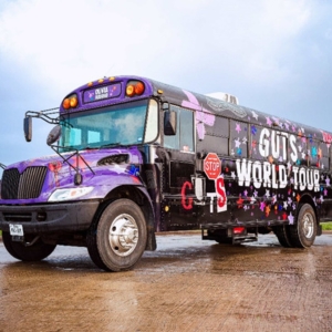 Enter the 'GUTS World Tour Bus' Before Seeing Olivia Rodrigo's Concert Video