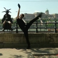 Dancer Performs to Melody Modeling the Structure of the Virus to Mark International D Photo