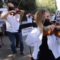 VIDEO: Israel Philharmonic Orchestra Performs Outside Knesset, Protesting the Governm Photo