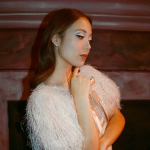 Video: Laufey Premieres 'Santa Baby' Music Video Featuring Bill Murray
