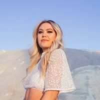 Bri Fletcher Gets Caught In Relationship Limbo In New Single 'Love Me Back' Photo