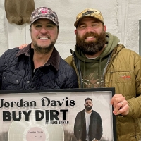 Jordan Davis and Luke Bryan Celebrate Platinum-Certified #1 Single 'Buy Dirt' Photo
