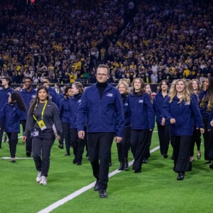 TUTS Musical Theatre Academy Ensemble Performs At The College Football Playoff Nation Photo
