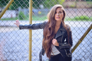 Tiffany Woys Debuts 'Hostage' Music Video Image