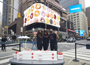 Cast Members Of CHICAGO Flip The Switch On New Krispy Kreme Doughnuts Shop Image