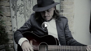 John Garrison Shares New Video For 'The Revolution Is Just Waiting A Name' Image