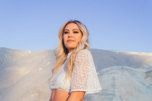 Bri Fletcher Gets Caught In Relationship Limbo In New Single 'Love Me Back' Image