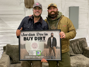 Jordan Davis and Luke Bryan Celebrate Platinum-Certified #1 Single 'Buy Dirt' 