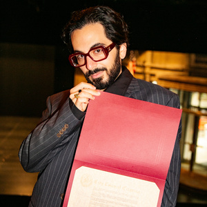DOG DAY AFTERNOON's Michael Shayan Honored By NYC Council Member Carl Wilson Photo