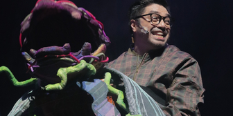 In LITTLE SHOP OF HORRORS, Sets and Puppetry Navigate Its Dark Themes