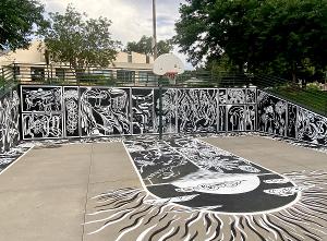 Local Artist Hosts Collaborative Coloring Book Mural At Sunken Gardens 