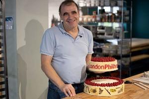 Great British Bake Off 2021 Semi-Finalist Jürgen Presents London Philharmonic Orchestra with 90th Birthday Cake 