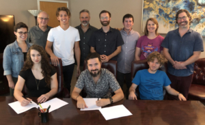 Fireside Collective Signs With Mountain Home Image