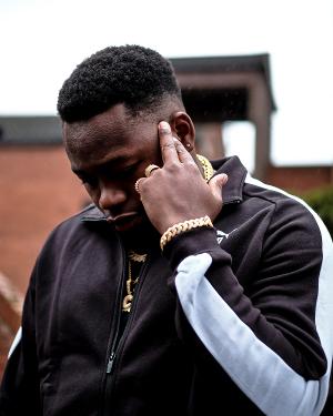 Rising Rap Star COLL Returns With Fiery, Funny 'Who's That' Image
