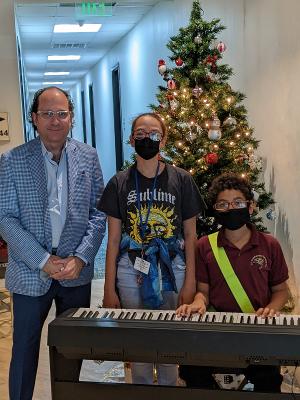 Legacy Foundation PBC Awards Music Scholarships And A New Keyboard To Unhoused Siblings  Image