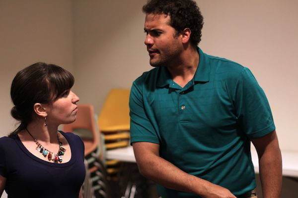 Joshua Woolfolk as Petruchio and Emily Morrison Weeks as the Tailor.