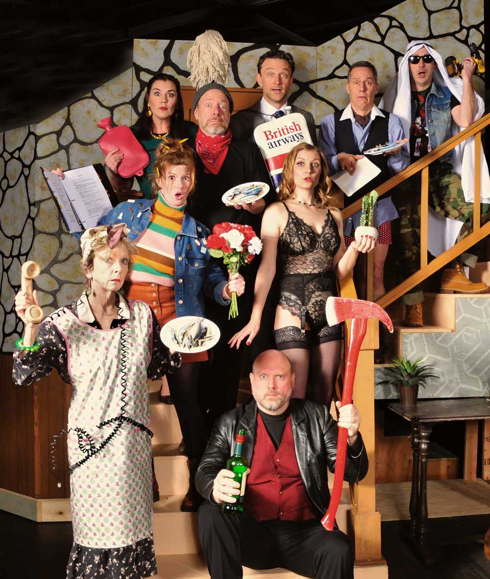 The company of actors in the comedy Noises Off playing at Lakewood Theatre Company, 368 S. State Street, Lake Oswego, OR 97034, February 28 - April 6, 2025. Photo by Triumph Photography.