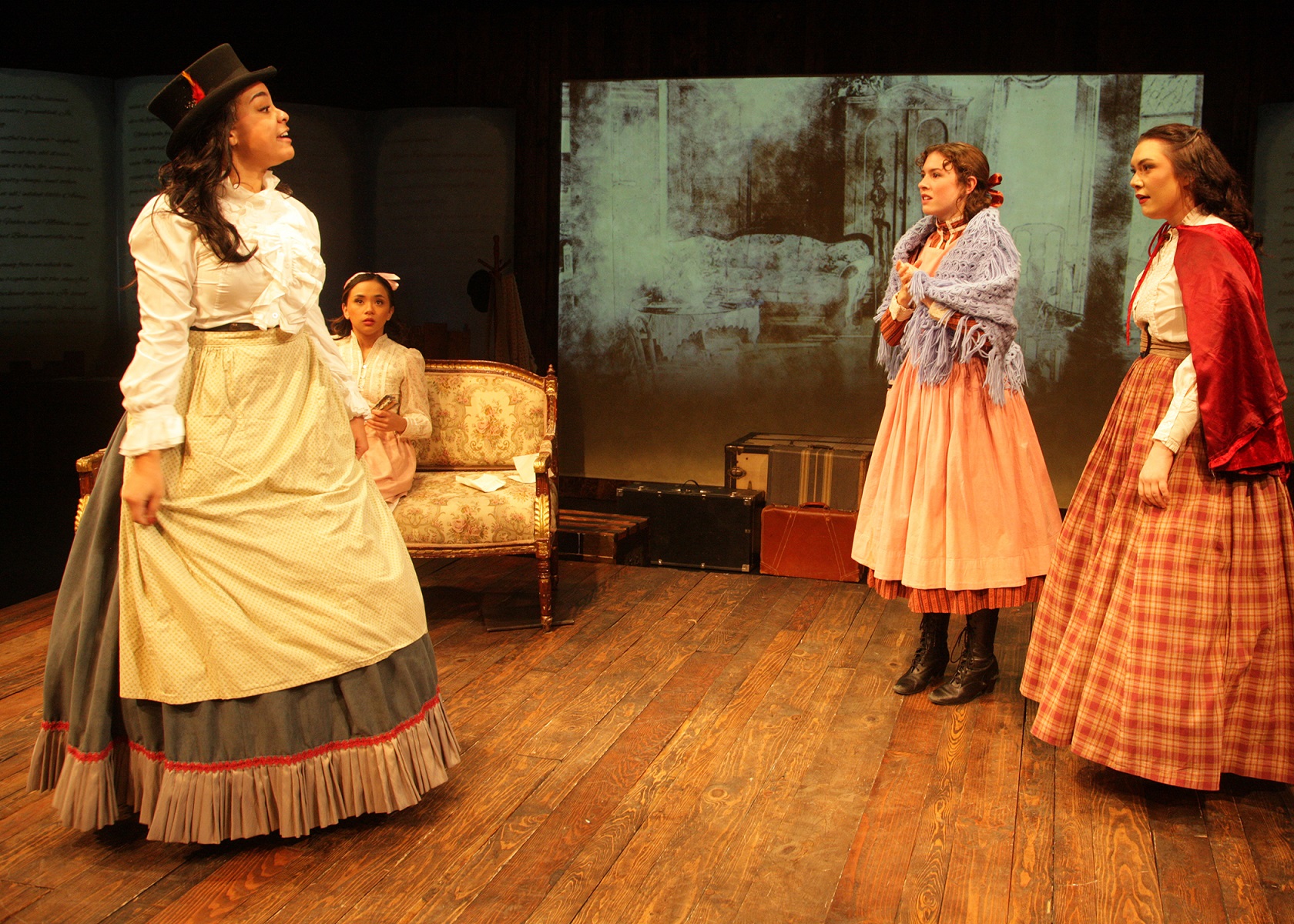 Katherine Chatman as Meg March, Camie Del Rosario as Amy March, Emily Abeles as Beth March, and Sarah Pierce as Jo March Chance Theater's production of 