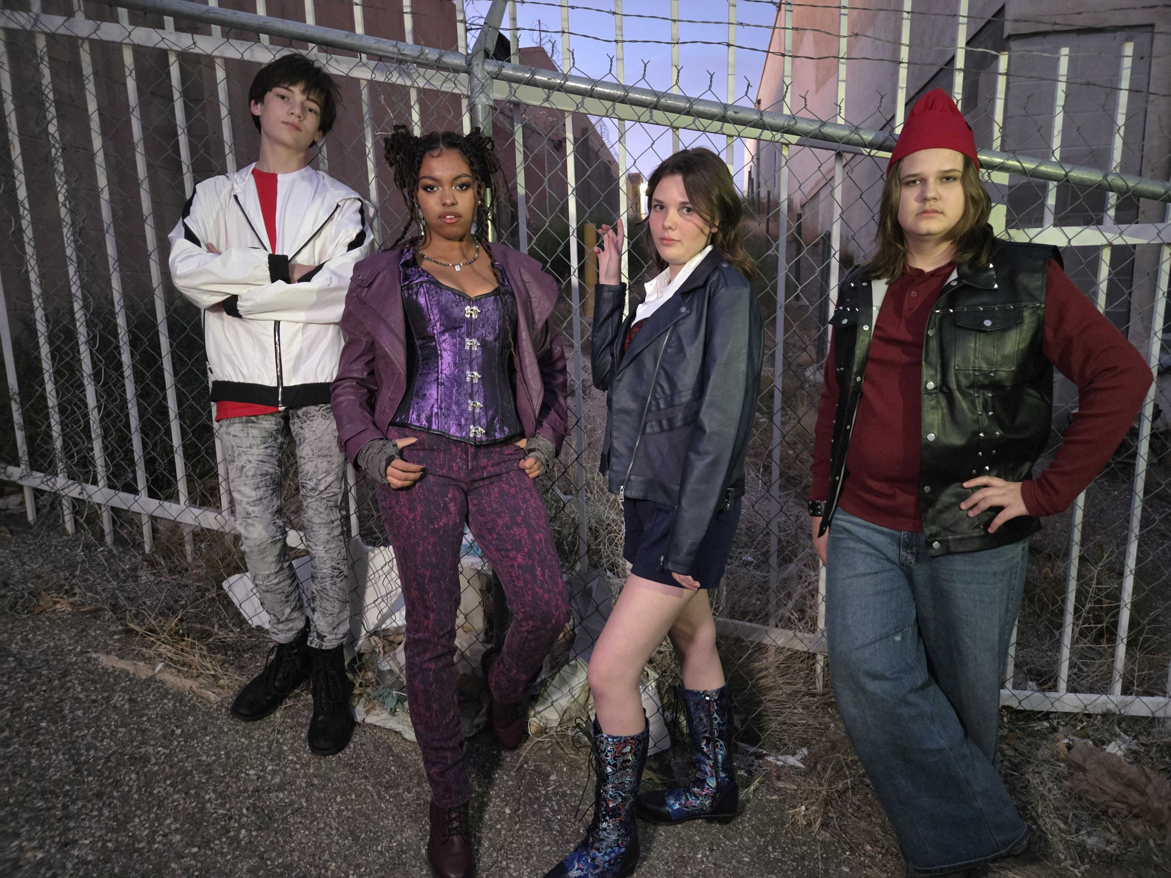 Michael Schut as Carlos, Marley Crump as Mal, Bea Busby as Evie, and Brady Gonzales as Jay