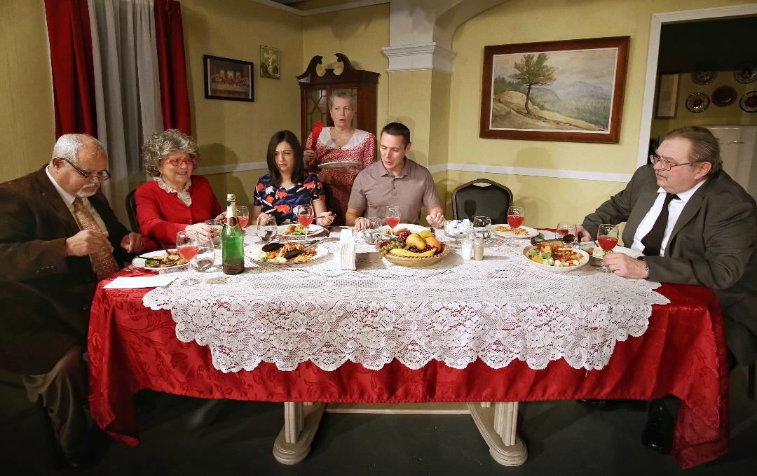 It's a Sunday dinner to remember for Nick Cristano in ACT's production of Over the River and Through the Woods. (Photo by Dave Cantelli).