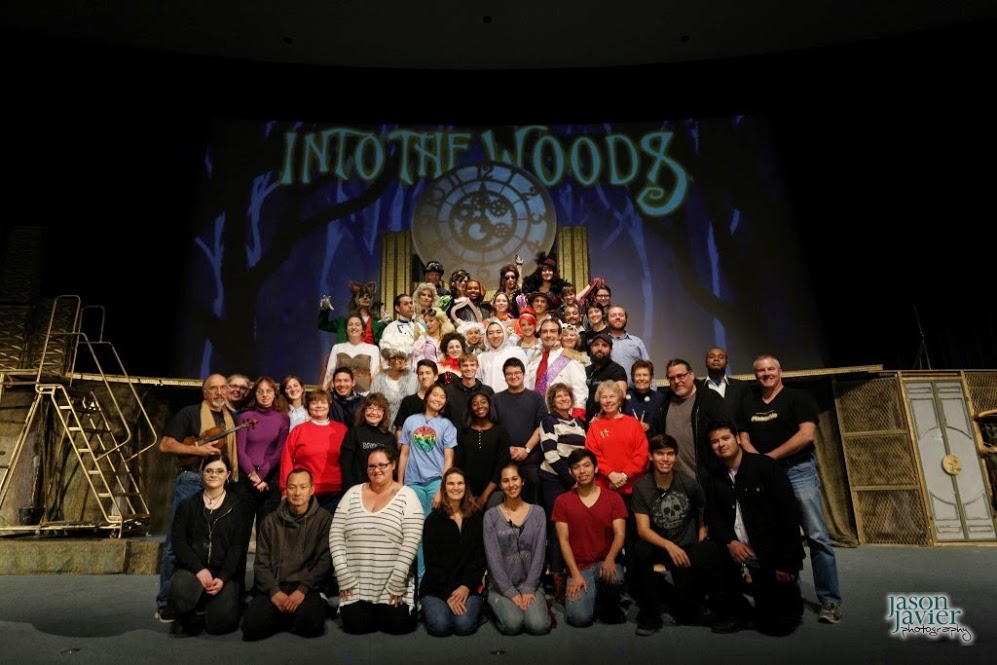 The Full Woods: Standing second from far right, Darryl Maximilian Robinson as The Narrator and The Mysterious Man is joined by the entire cast, orchestra and crew of the 2014 revival of Into The Woods