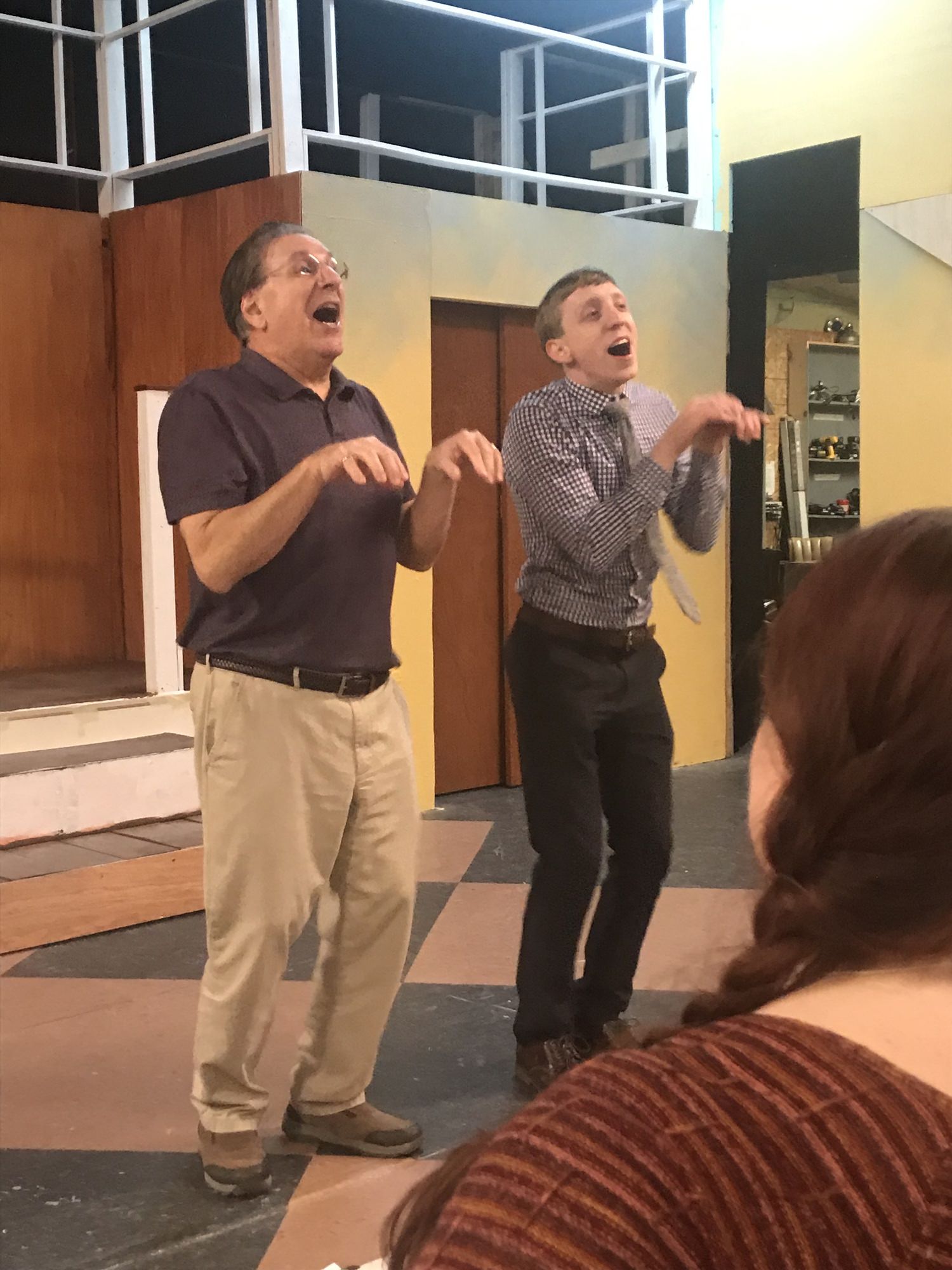 John Zinzi, of Milton, as J. B. Biggley and Steven Dow, of Rehoboth Beach as J. Pierrepont Finch ?Rip the Chipmunk? as they rehearse a scene for Possum Point Players? upcoming musical comedy HOW TO SUCCEED IN BUSINESS WITHOUT REALLY TRYING April 5 - 12, 2019. Co-Director Lorraine Steinhoff, of Milford, looks on. For more information, please go to www.possumpointplayers.org or call (302)856-4560. 