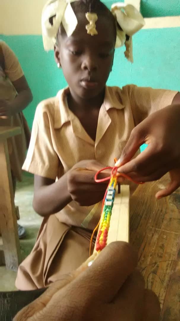 About the Jewelry: The children from the school of L'ecole Dinaus Mixed have an after school jewelry club where they learn to make bracelet. The Bracelet are full of vibrant colors.